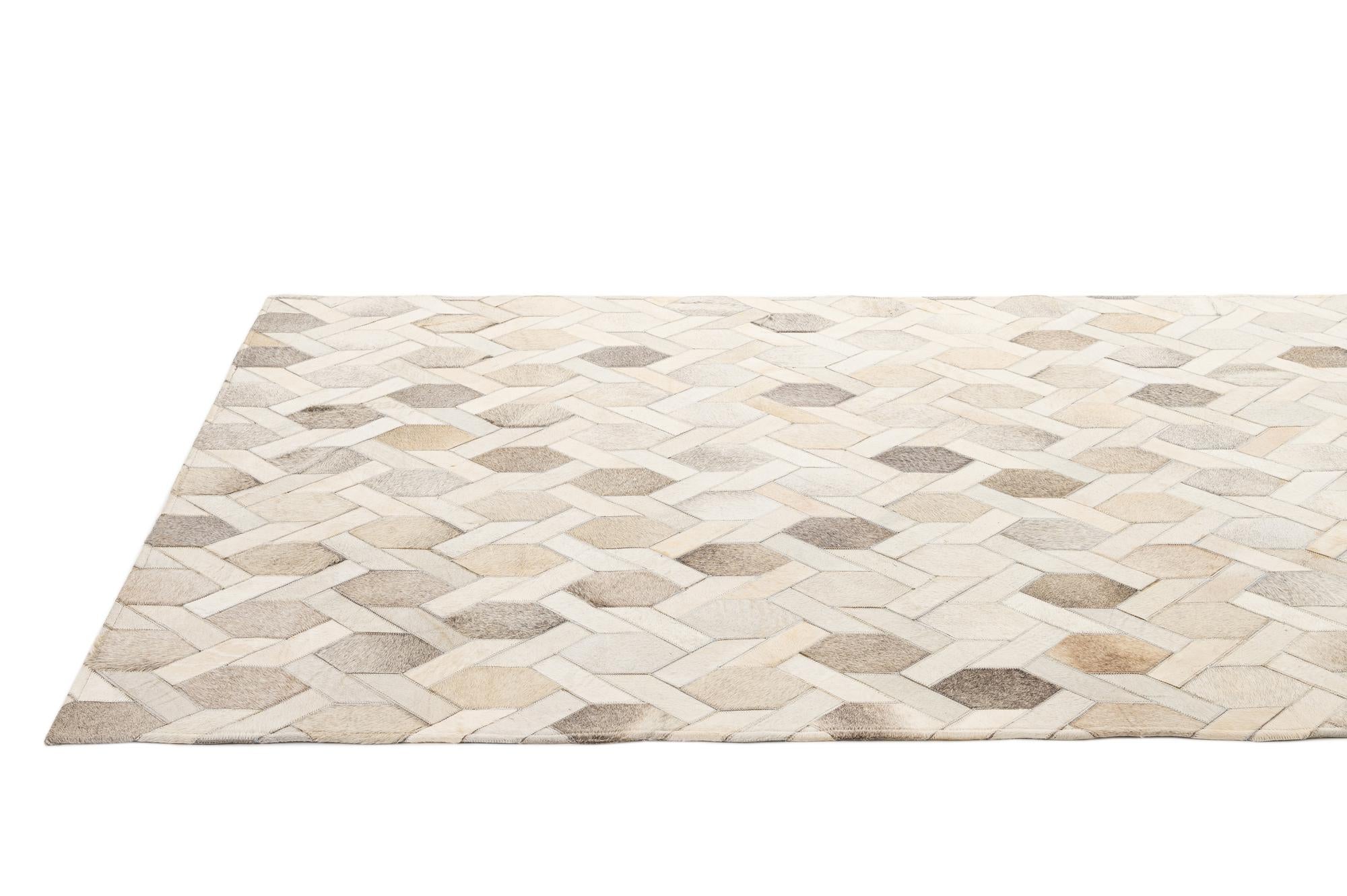 4' 11 x 8' 1 Cowhide - Patchwork Rug