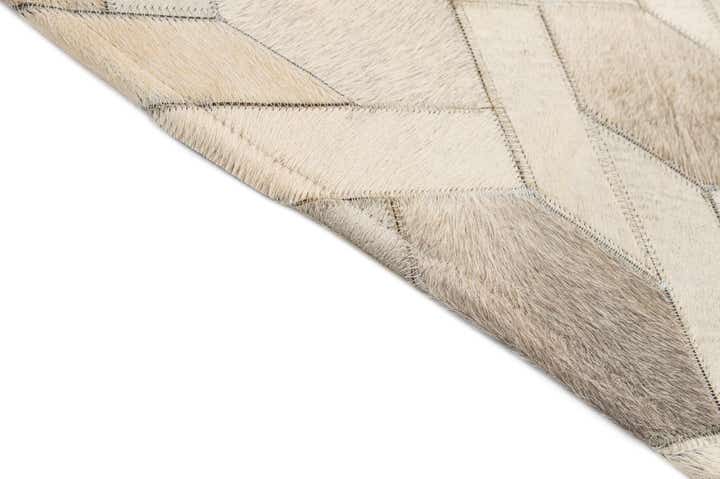 4' 11 x 8' 1 Cowhide - Patchwork Rug