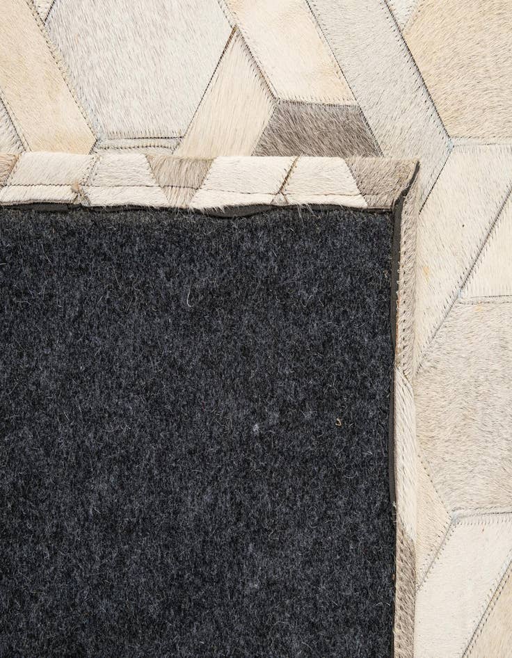 Detail image of 4' 11 x 8' 1 Cowhide - Patchwork Rug