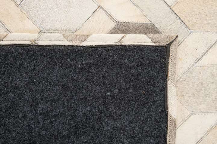 4' 11 x 8' 1 Cowhide - Patchwork Rug