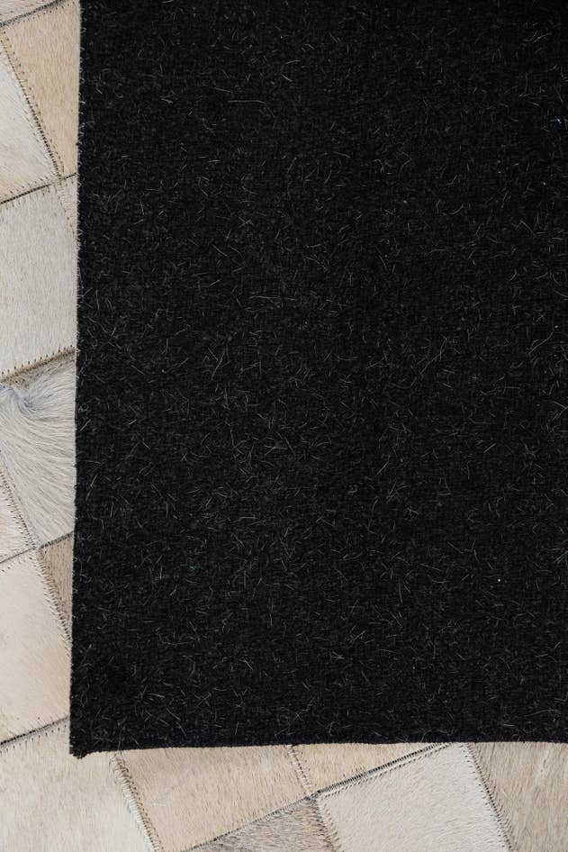 Detail image of 5' 1 x 8' Cowhide Leather Rug