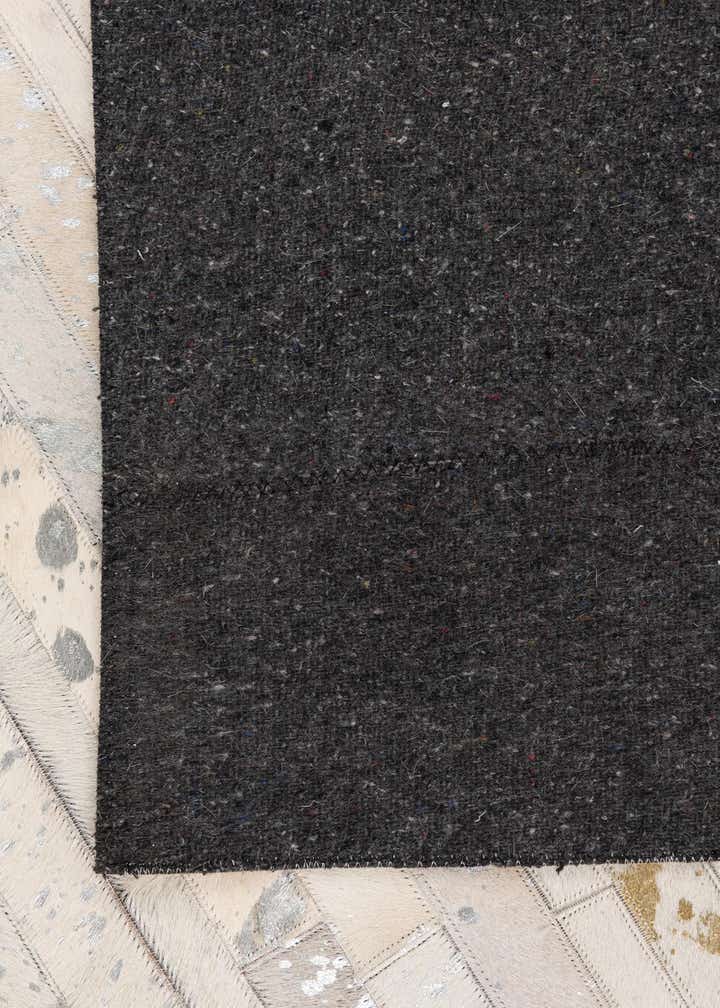 5' 2 x 7' 10 Cowhide Leather Rug