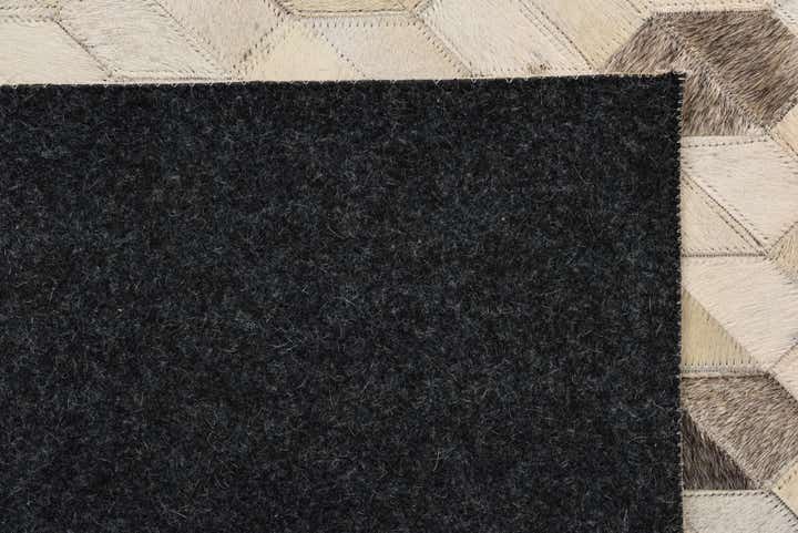 5' 1 x 7' 4 Cowhide Rug