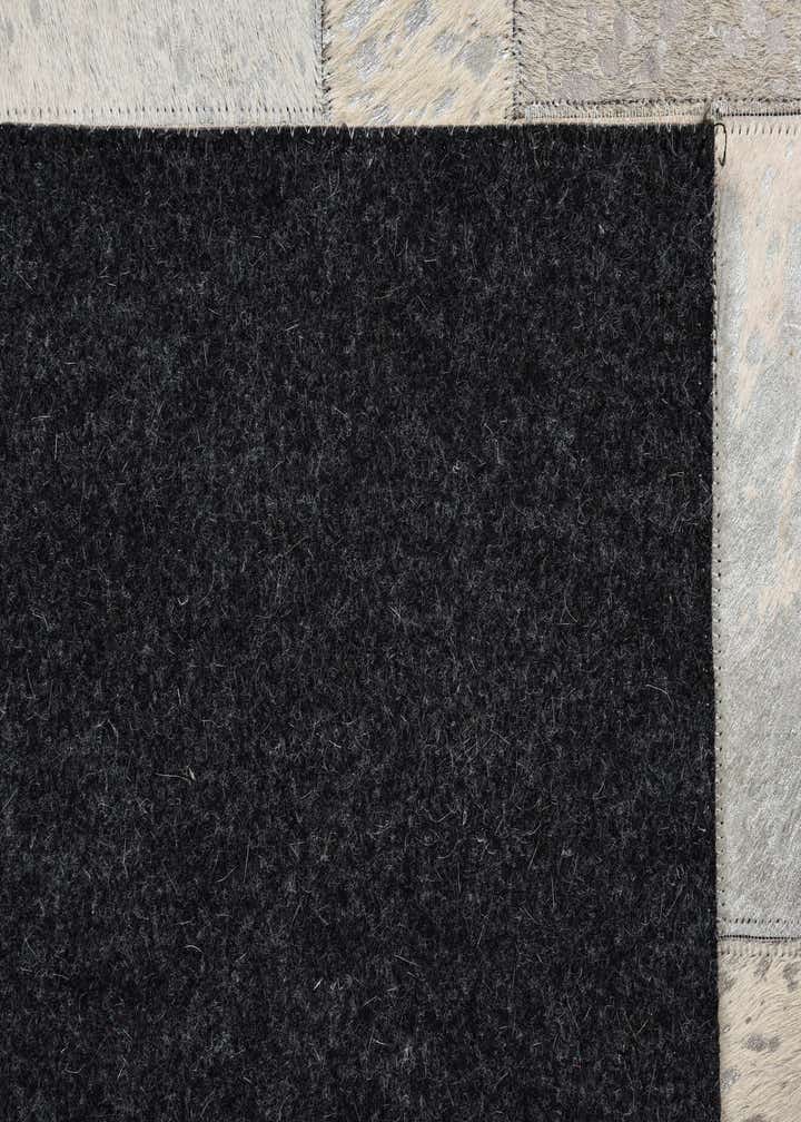 5' 2 x 8' 3 Cowhide Rug