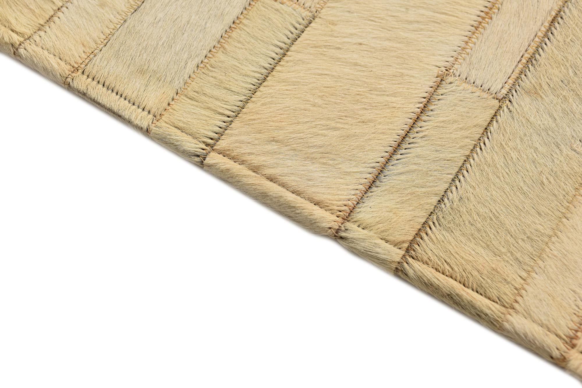 2' 1 x 3' Cowhide Rug