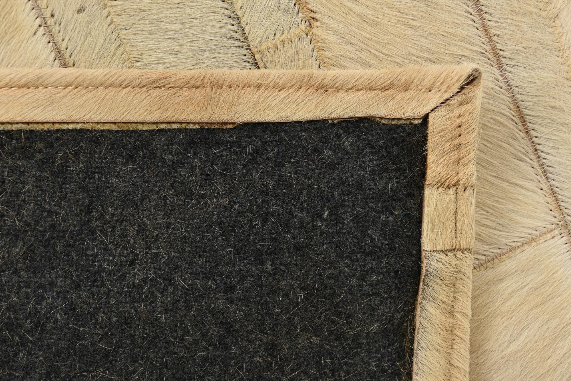 2' 1 x 3' Cowhide Rug