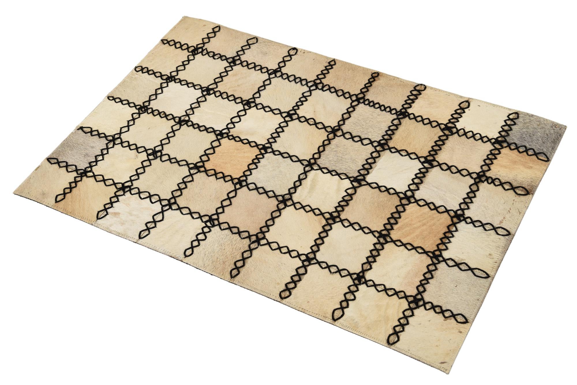 2' 1 x 3' 1 Cowhide Rug
