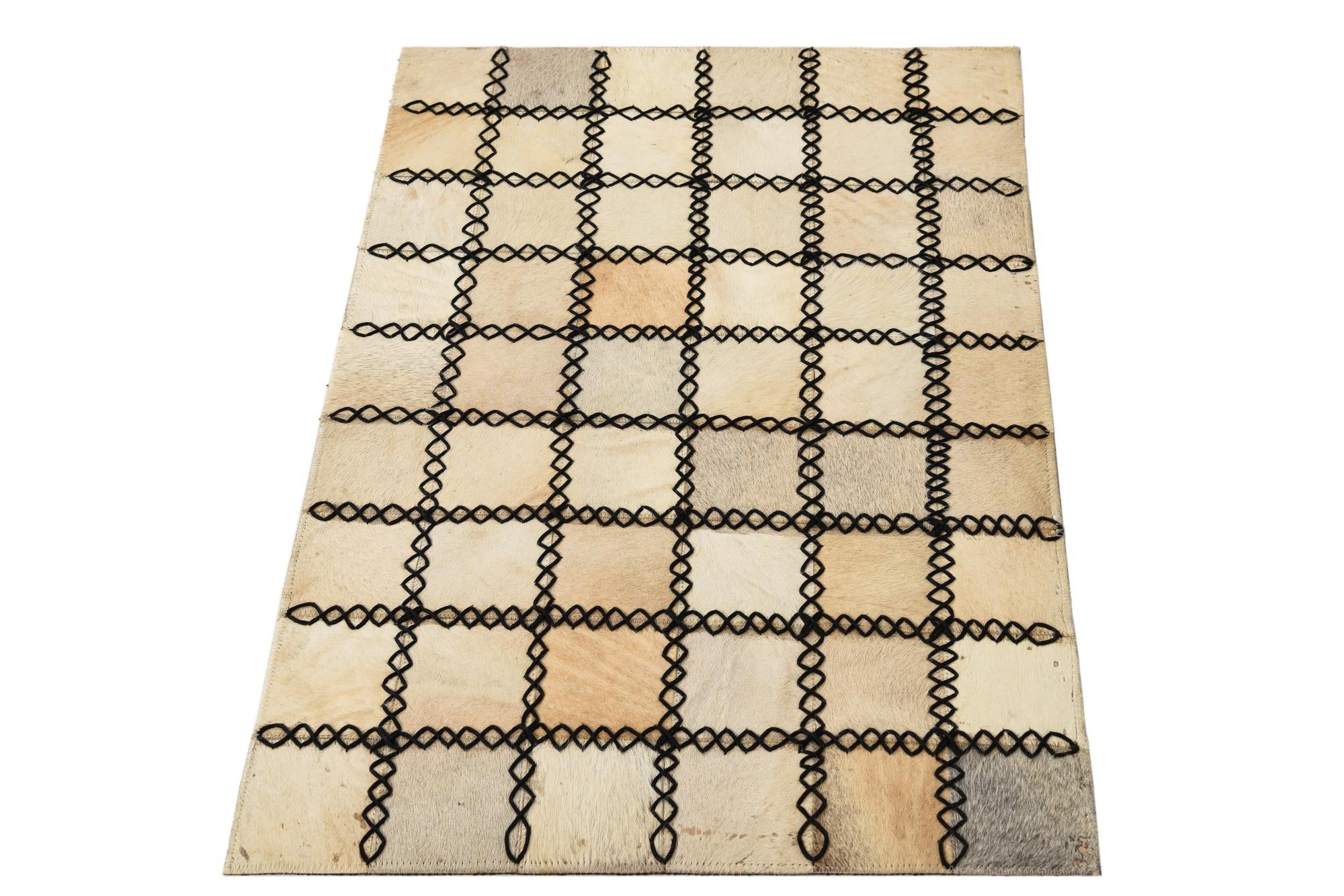 2' 1 x 3' 1 Cowhide Rug