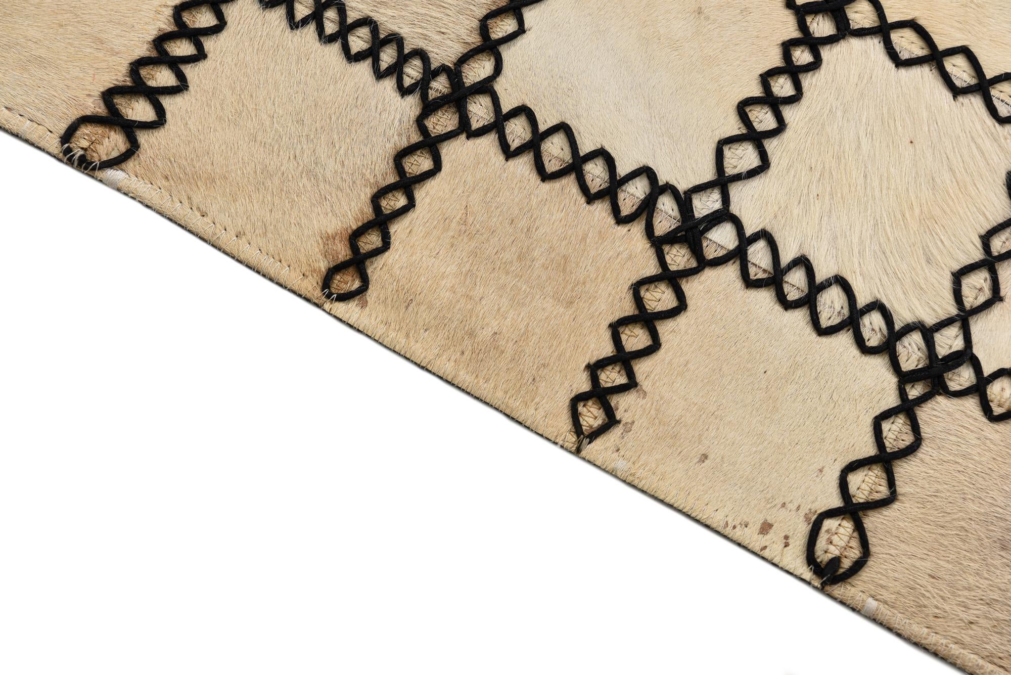 2' 1 x 3' 1 Cowhide Rug