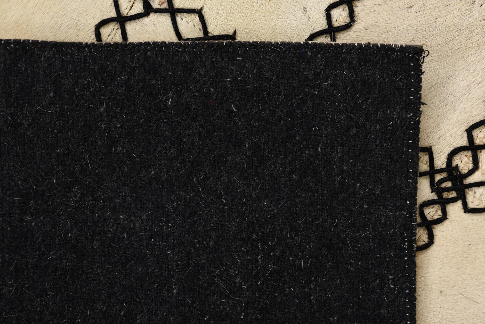 2' 1 x 3' 1 Cowhide Rug