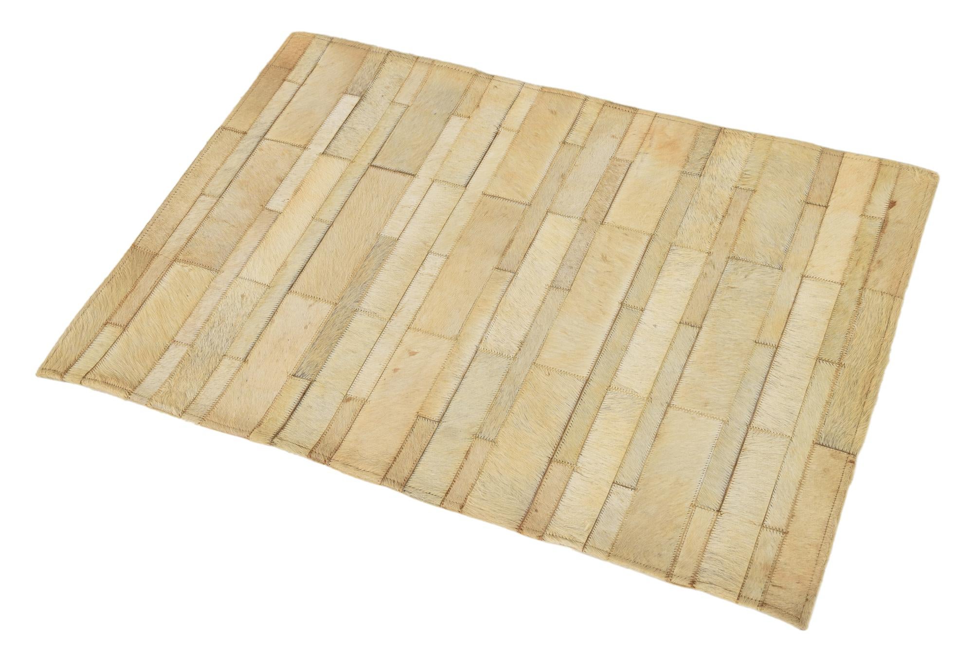 2' 2 x 3' Cowhide Rug