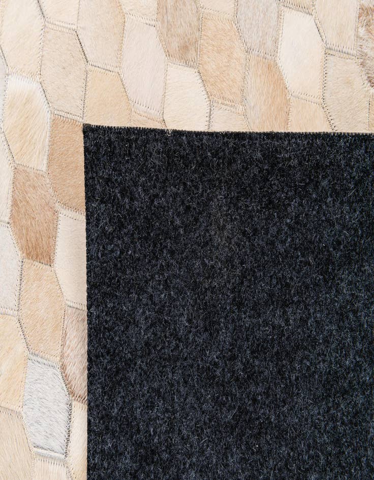 Detail image of 6' 8 x 10' 1 Cowhide Stocks Rug