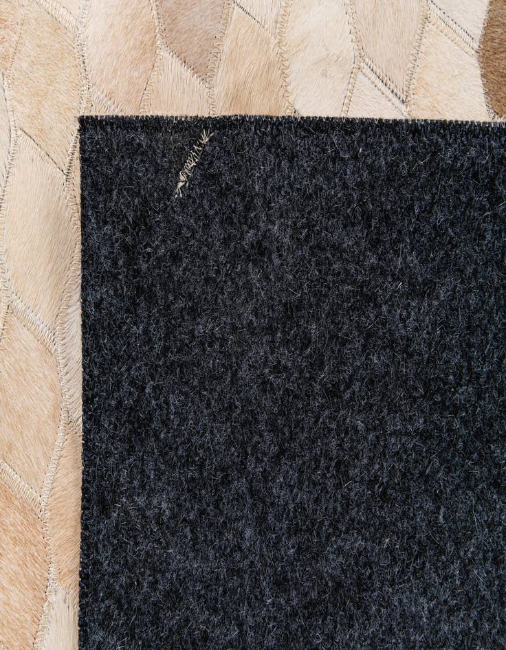 Detail image of 6' 7 x 9' 11 Cowhide Stocks Rug
