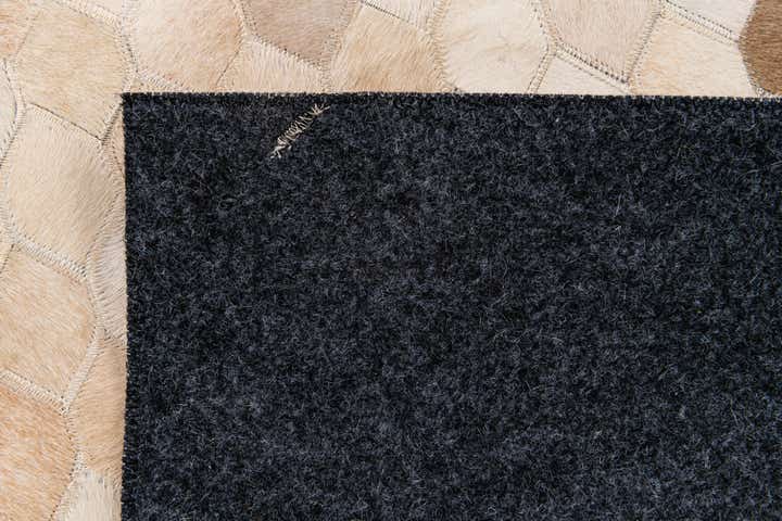 6' 7 x 9' 11 Cowhide Stocks Rug