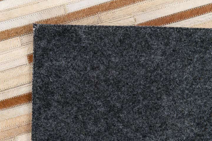 5' 1 x 7' 11 Cowhide Stocks Rug