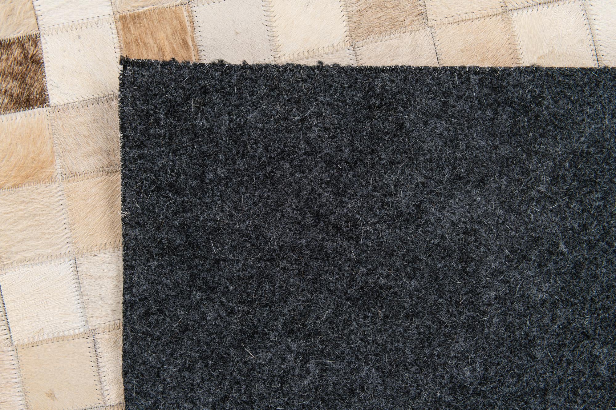 5' 1 x 7' 11 Cowhide Stocks Rug