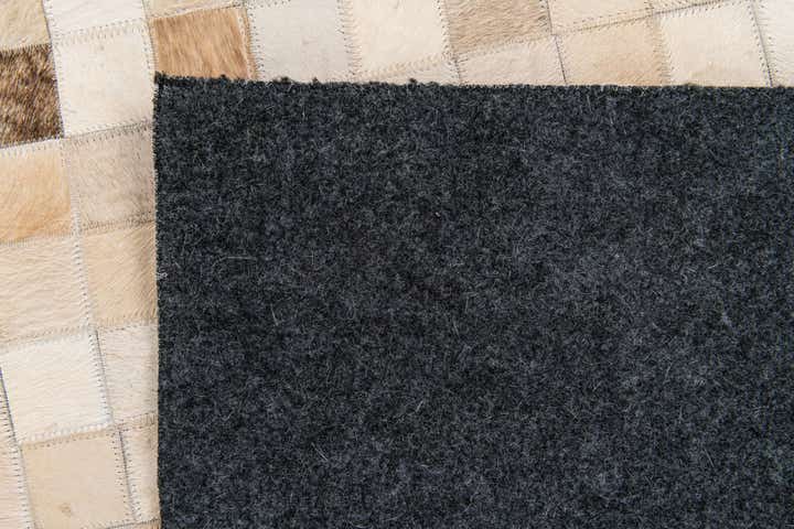 5' 1 x 7' 11 Cowhide Stocks Rug