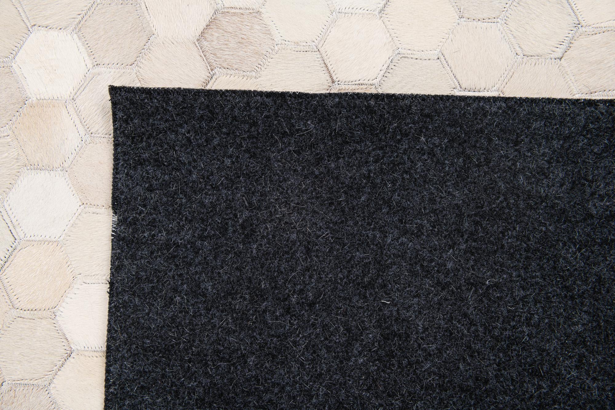 4' 11 x 7' 11 Cowhide Stocks Rug