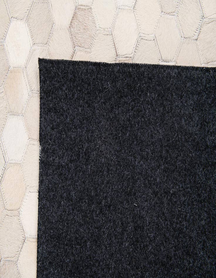 Detail image of 4' 11 x 7' 11 Cowhide Stocks Rug