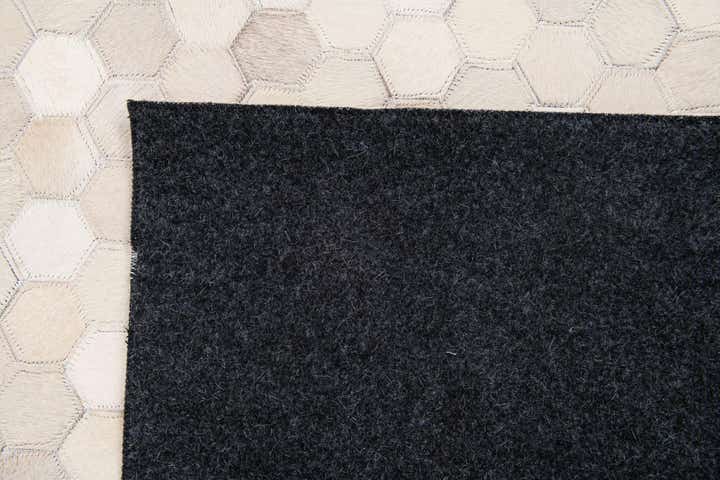 4' 11 x 7' 11 Cowhide Stocks Rug