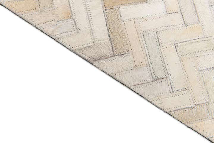 4' 10 x 7' 7 Cowhide Stocks Rug