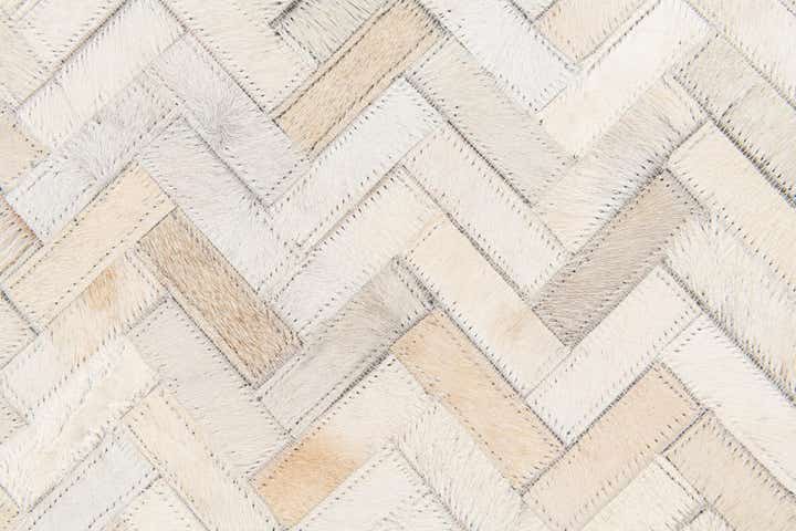 4' 10 x 7' 7 Cowhide Stocks Rug