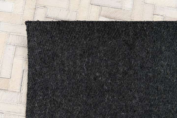 4' 10 x 7' 7 Cowhide Stocks Rug