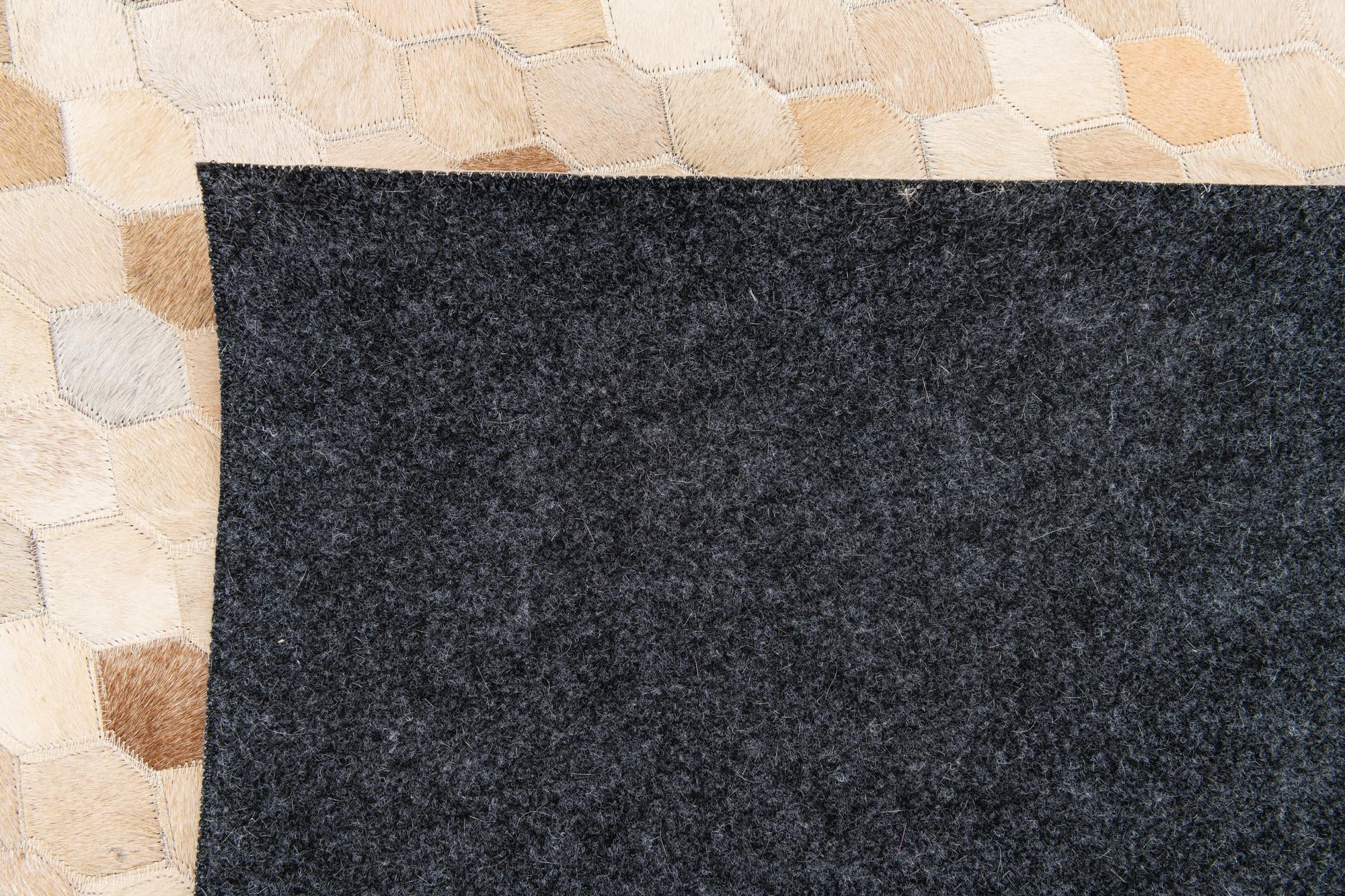 5' 7 x 8' Cowhide Stocks Rug