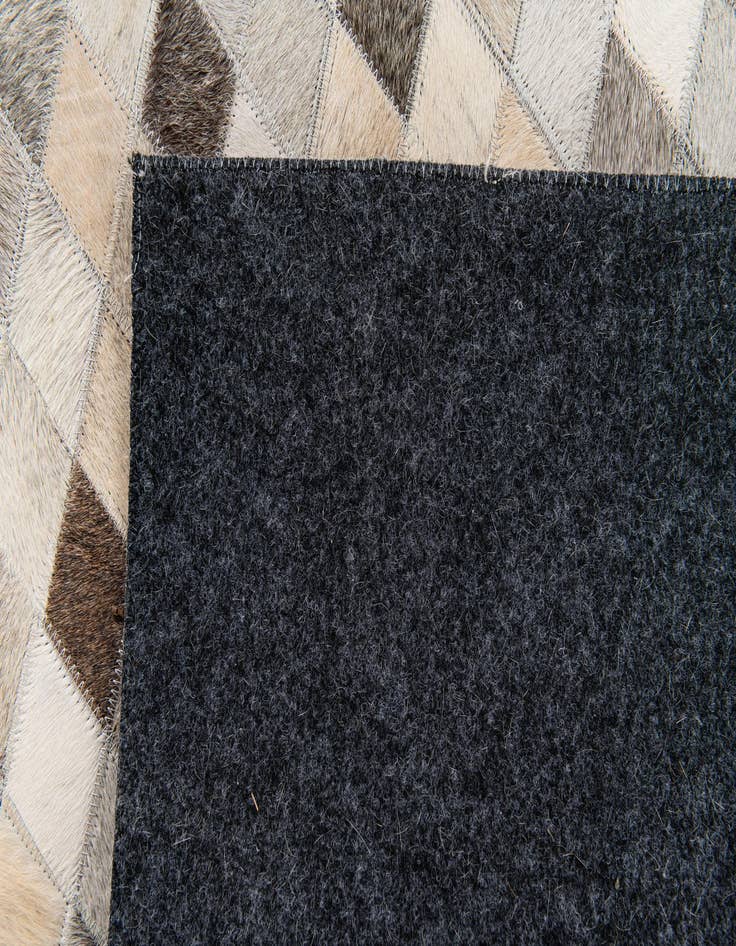 Detail image of 5' 8 x 7' 9 Cowhide Stocks Rug