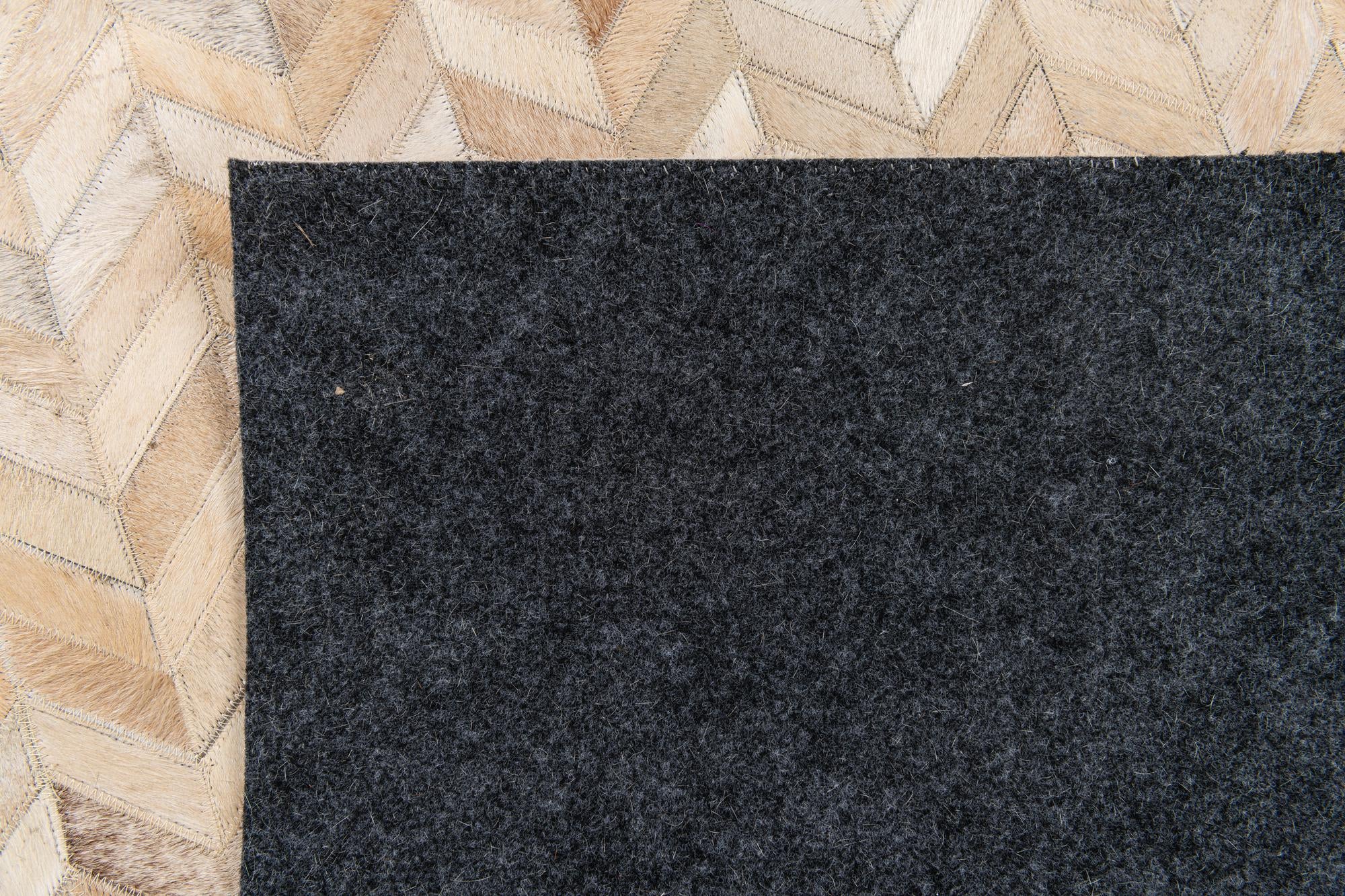 5' 1 x 8' Cowhide Stocks Rug