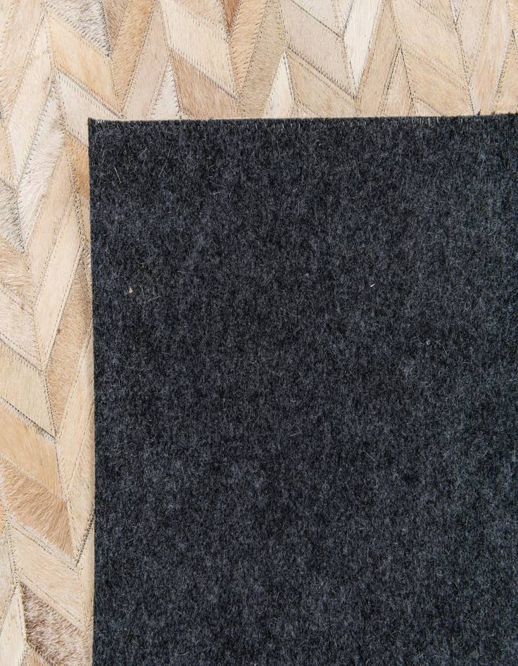 Detail image of 5' 1 x 8' Cowhide Stocks Rug