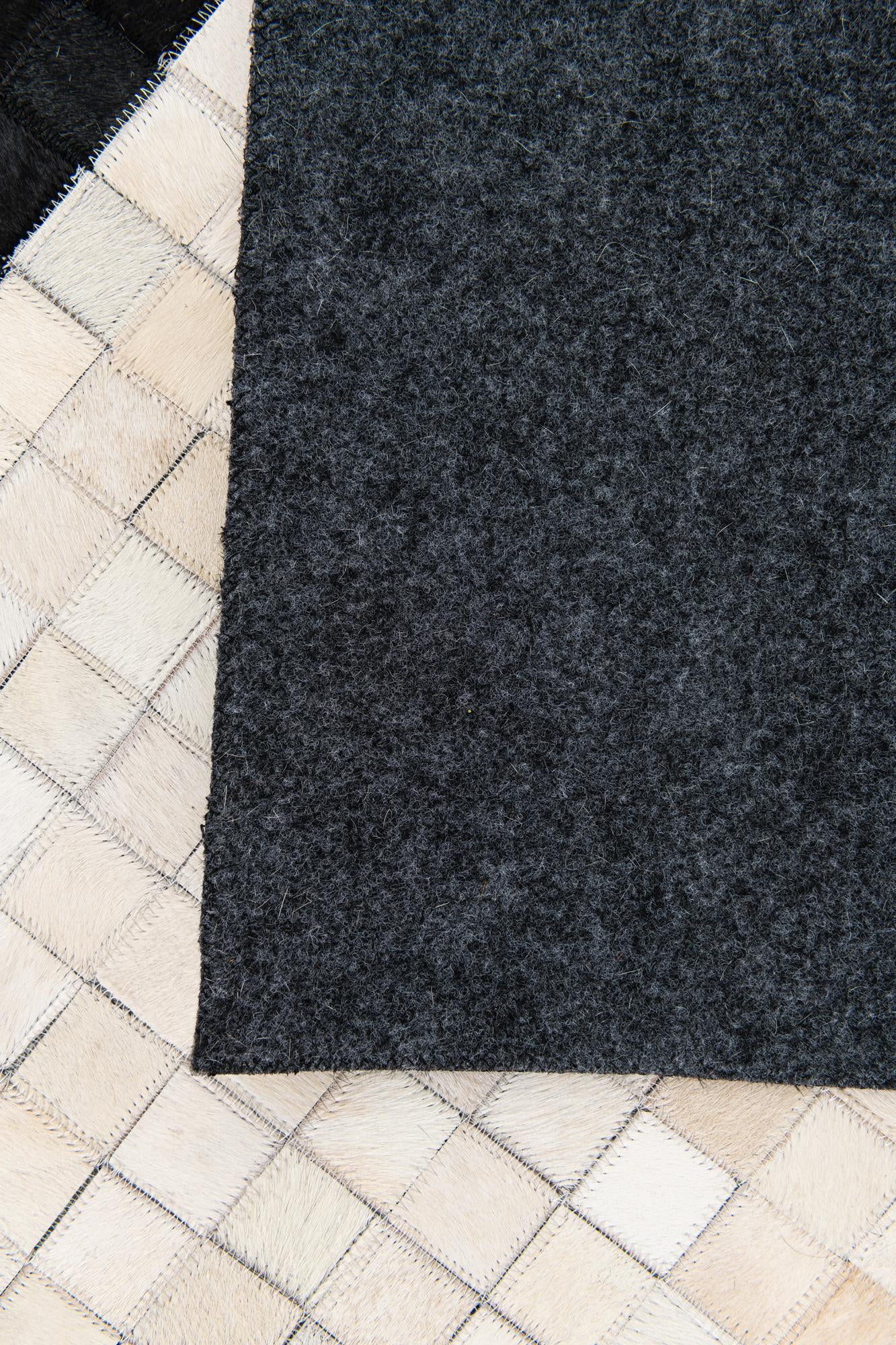 5' 1 x 8' Cowhide Stocks Rug