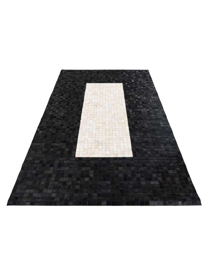 5' 2 x 8' 1 Cowhide Stocks Rug