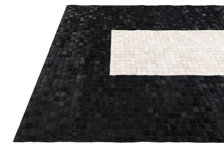 5' 2 x 8' 1 Cowhide Stocks Rug