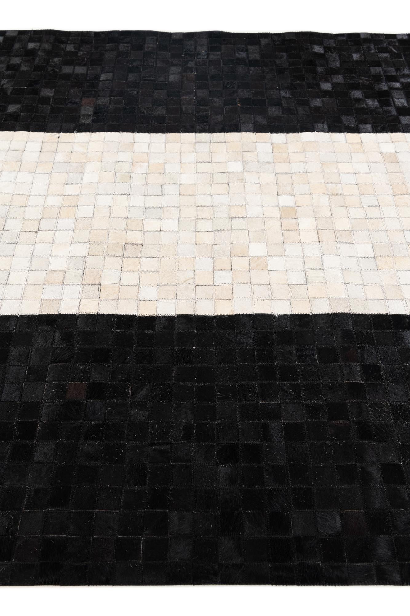 5' 2 x 8' 1 Cowhide Stocks Rug