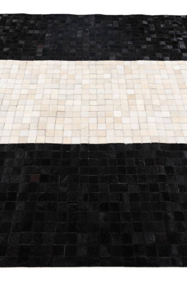 Detail image of 5' 2 x 8' 1 Cowhide Stocks Rug