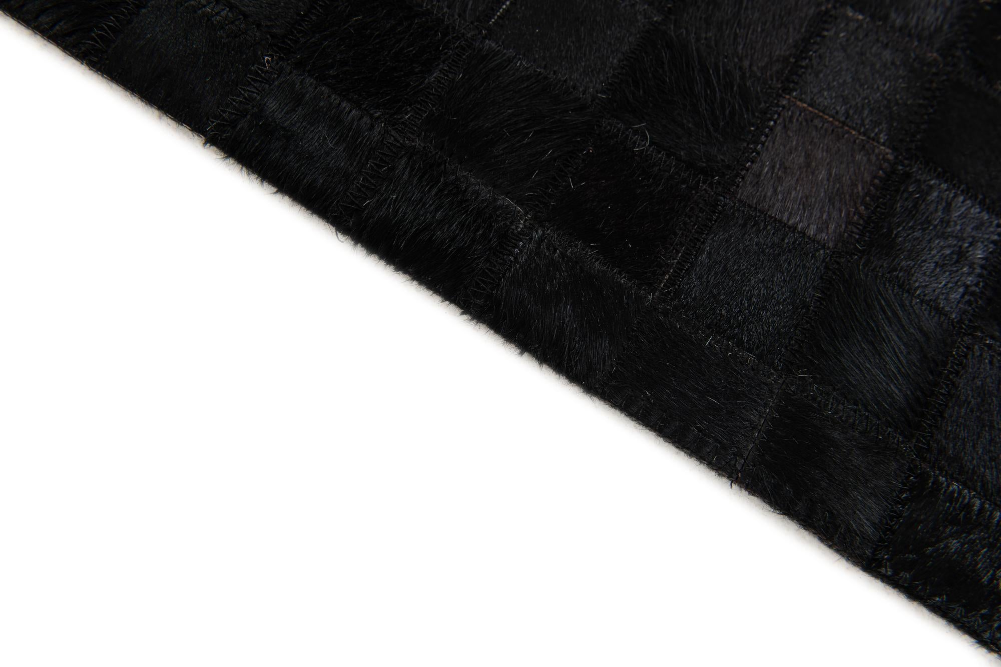 5' 2 x 8' 1 Cowhide Stocks Rug