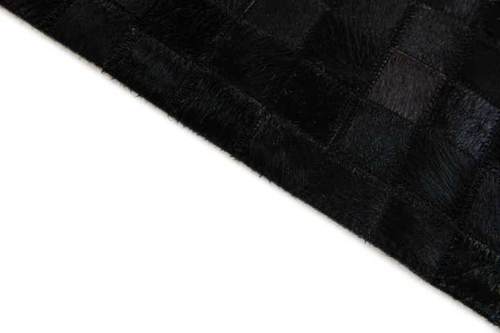 5' 2 x 8' 1 Cowhide Stocks Rug