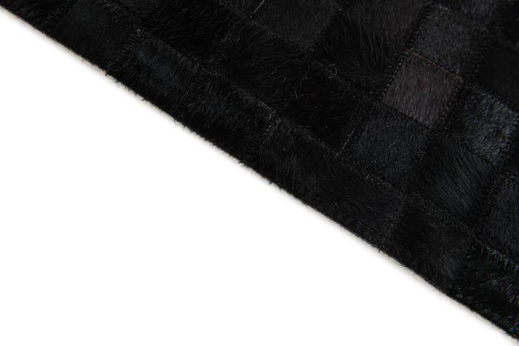 Detail image of 5' 2 x 8' 1 Cowhide Stocks Rug