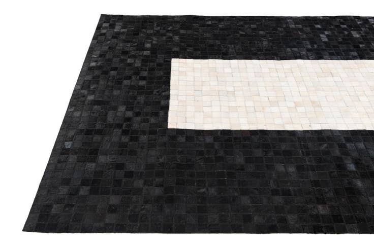 Detail image of 4' 11 x 8' Cowhide Stocks Rug
