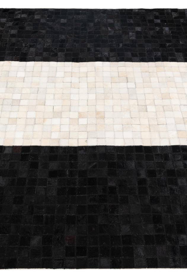 Detail image of 4' 11 x 8' Cowhide Stocks Rug