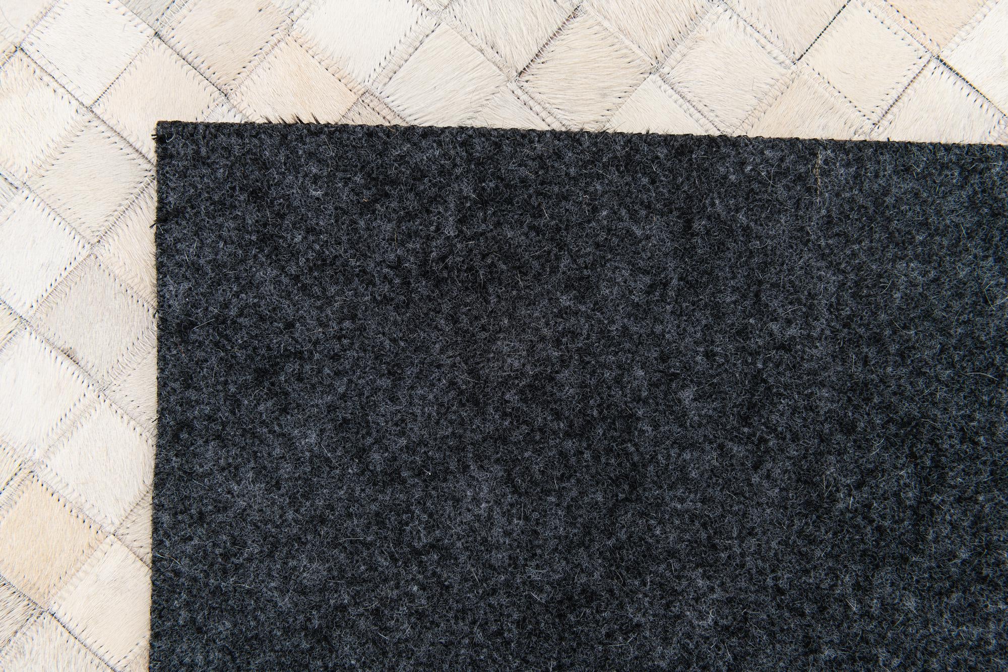 4' 11 x 8' Cowhide Stocks Rug