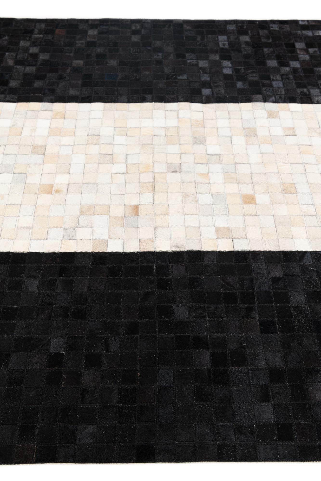 5' 1 x 7' 10 Cowhide Stocks Rug
