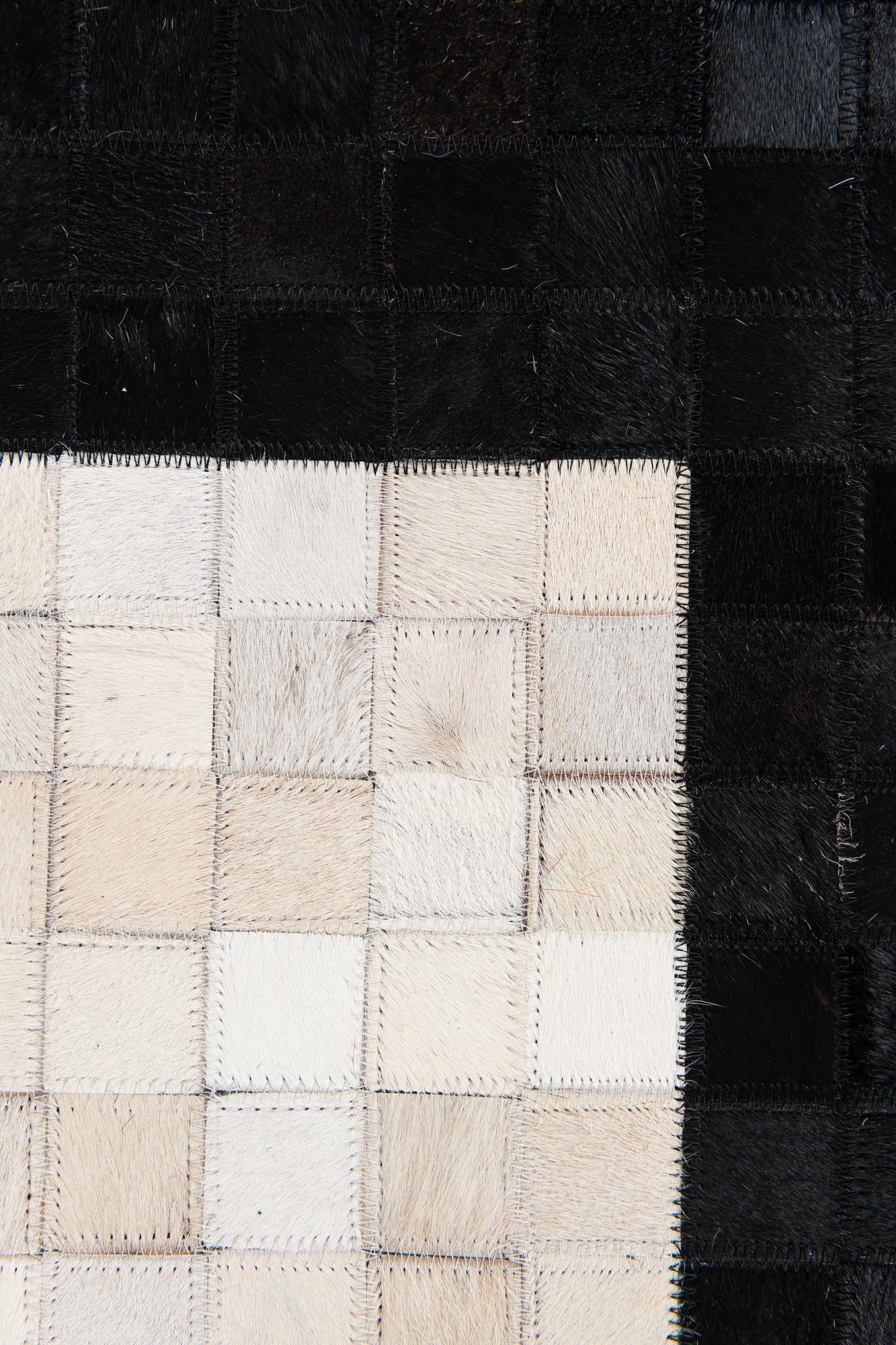 5' 1 x 7' 10 Cowhide Stocks Rug