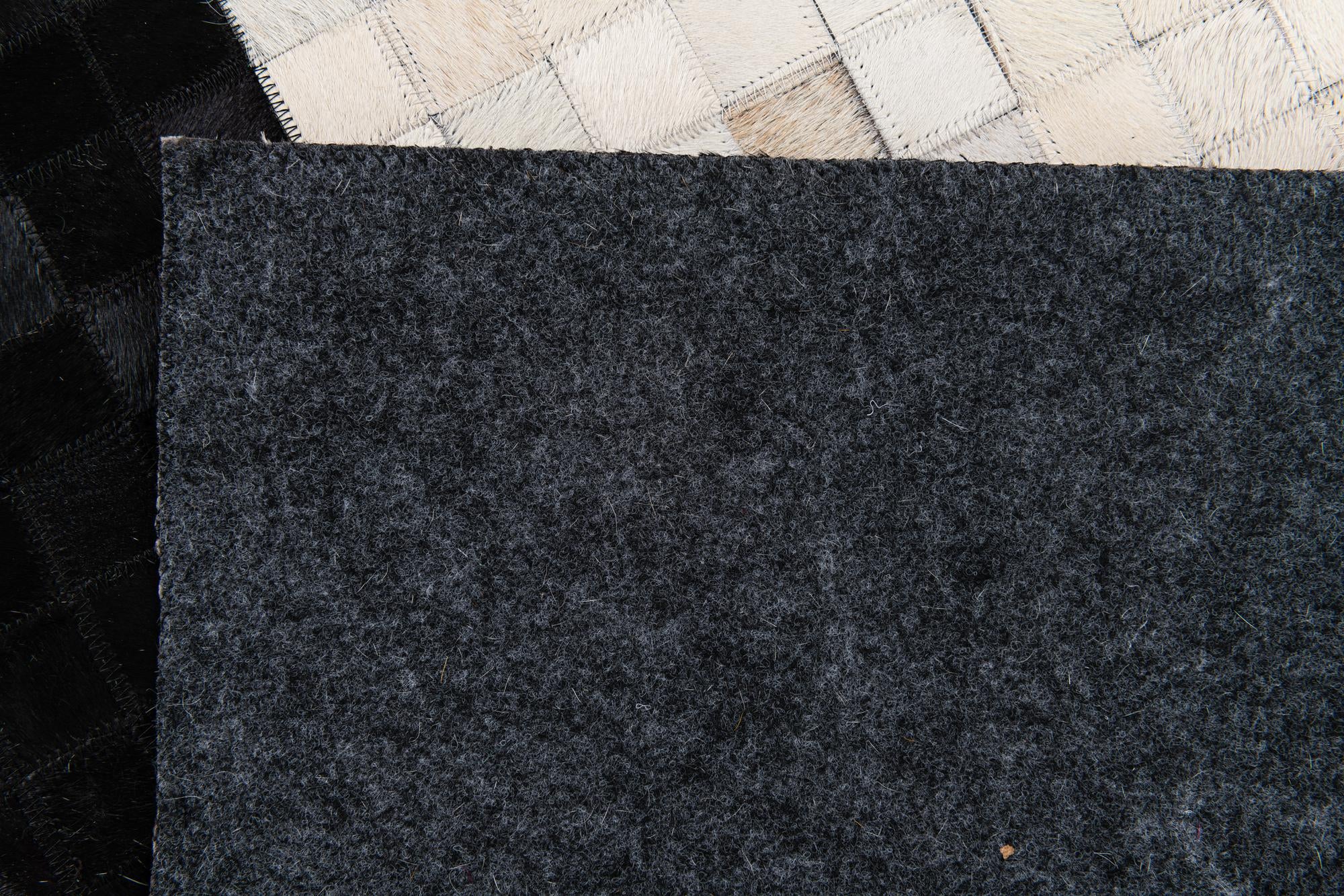5' 1 x 7' 10 Cowhide Stocks Rug