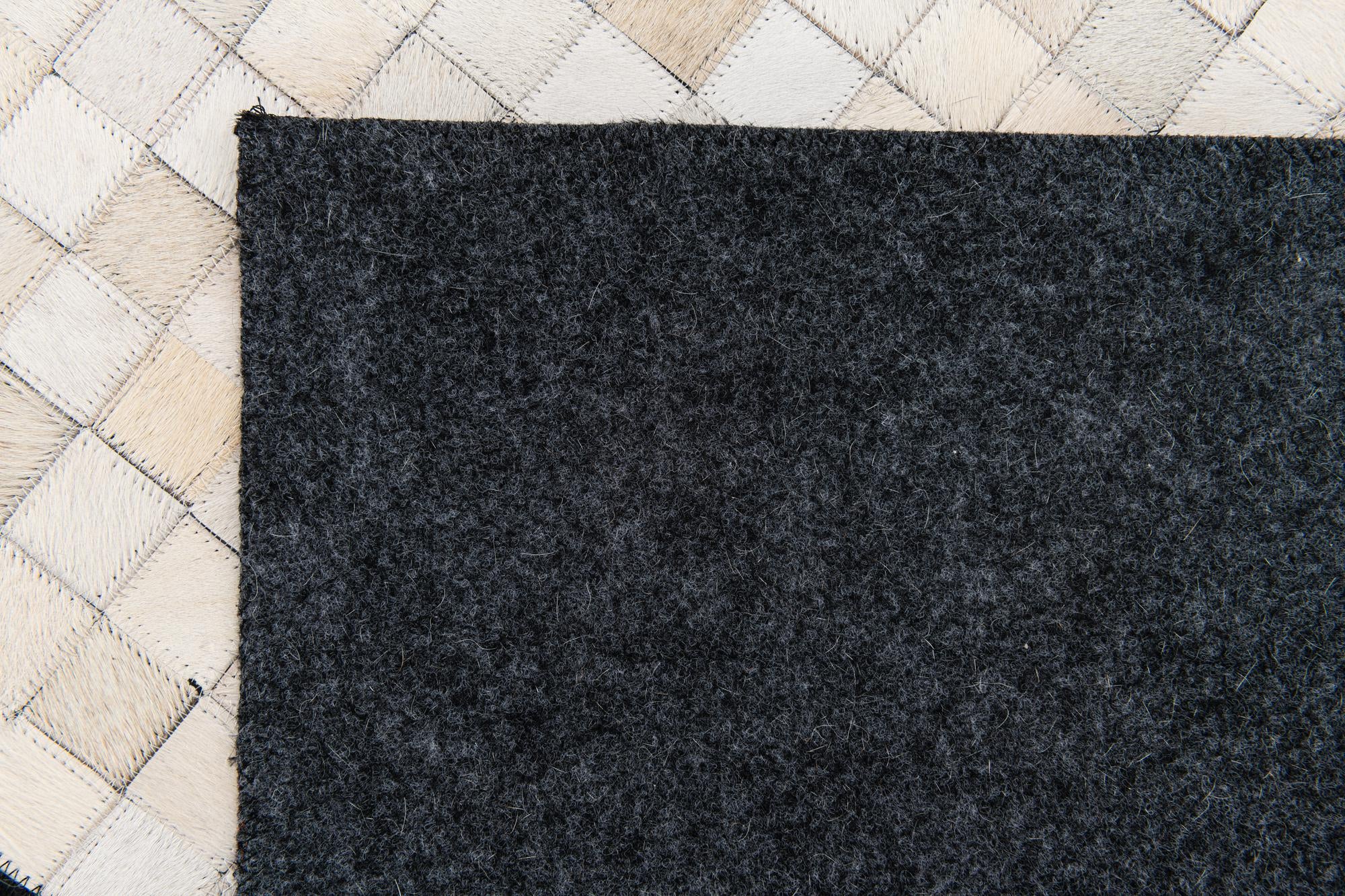 5' 1 x 8' 1 Cowhide Stocks Rug