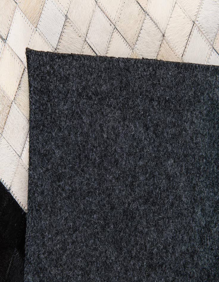 Detail image of 5' x 8' 1 Cowhide Stocks Rug