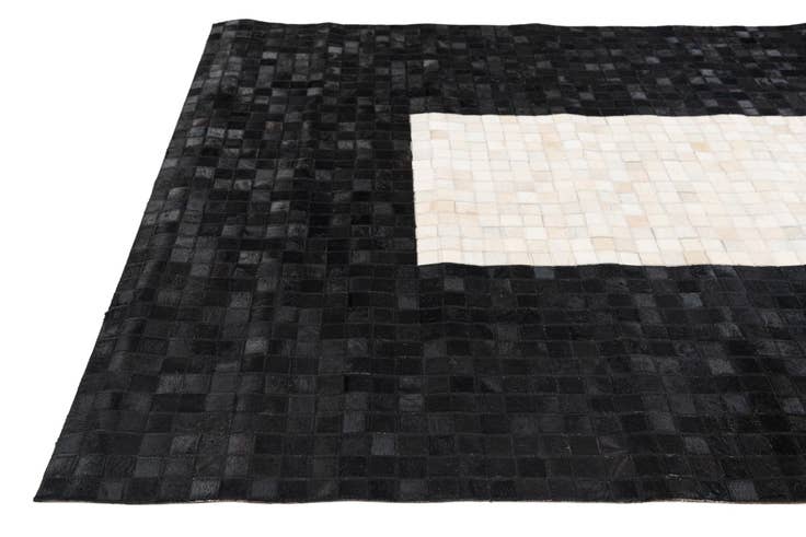 Detail image of 5' x 7' 11 Cowhide Stocks Rug