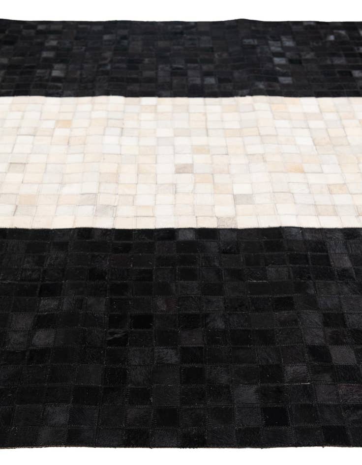 Detail image of 5' x 7' 11 Cowhide Stocks Rug