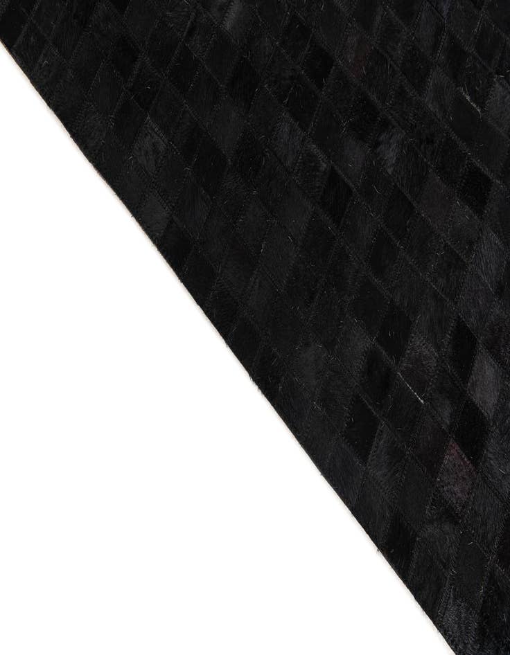 Detail image of 5' x 7' 11 Cowhide Stocks Rug